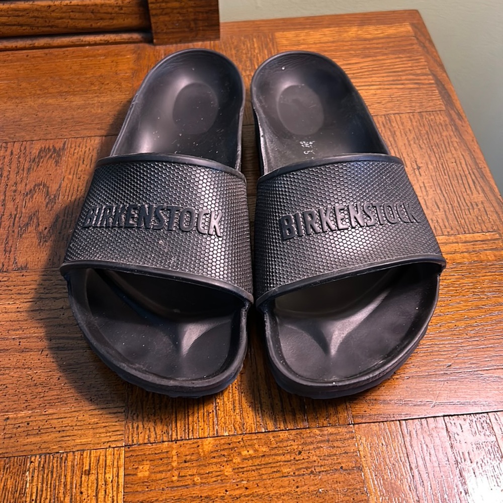 Birkenstock black slides.